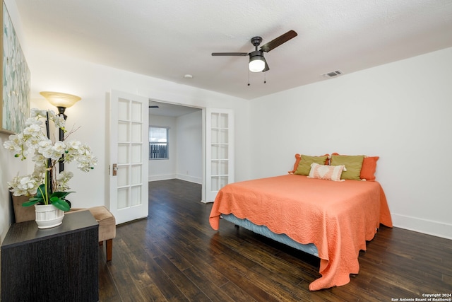 bedroom with wood-type flooring, french doors, and ceiling fan