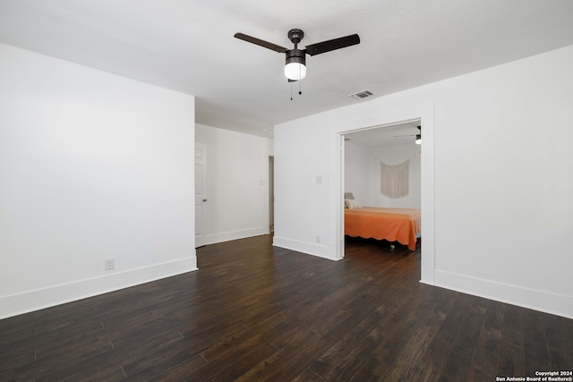 unfurnished room with hardwood / wood-style floors and ceiling fan