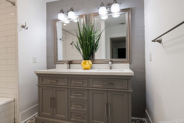 bathroom with dual vanity