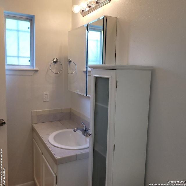 bathroom featuring oversized vanity