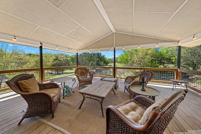 wooden terrace with outdoor lounge area