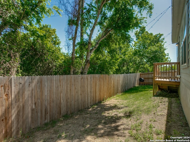 view of yard with a deck