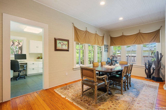 dining room featuring light tile floors and plenty of natural light