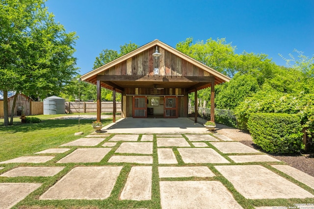 view of patio / terrace featuring a storage shed