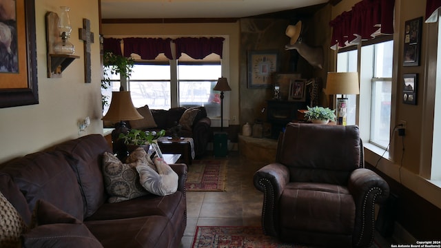 tiled living room featuring ornamental molding