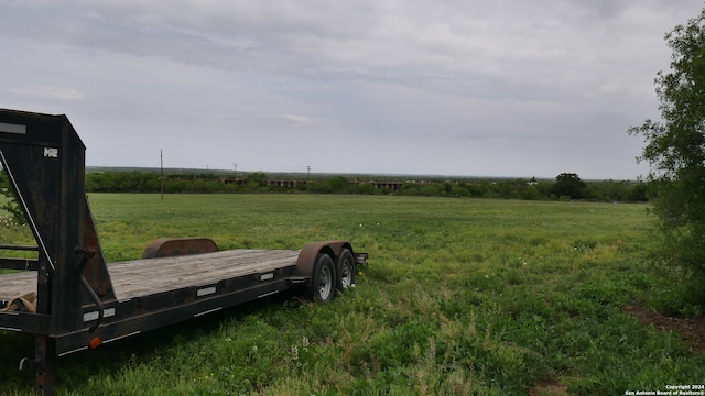 view of yard with a rural view