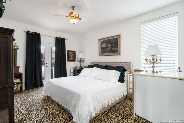 bedroom featuring ceiling fan, carpet flooring, and access to exterior