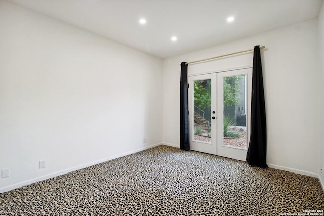 3678 Hidden Dr Unit 704, San Antonio, TX 78217 - carpeted spare room with french doors, baseboards, and recessed lighting