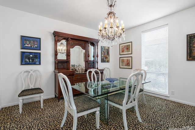 dining space featuring a chandelier