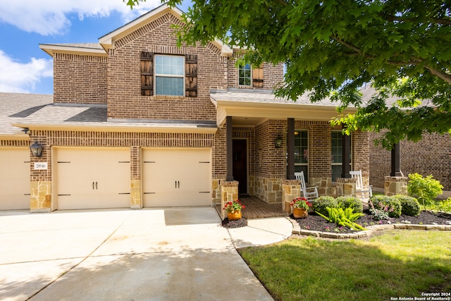 view of front of home with a garage