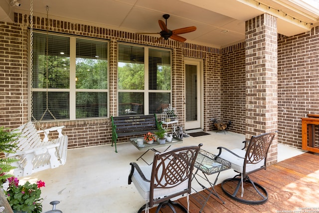 view of terrace featuring ceiling fan