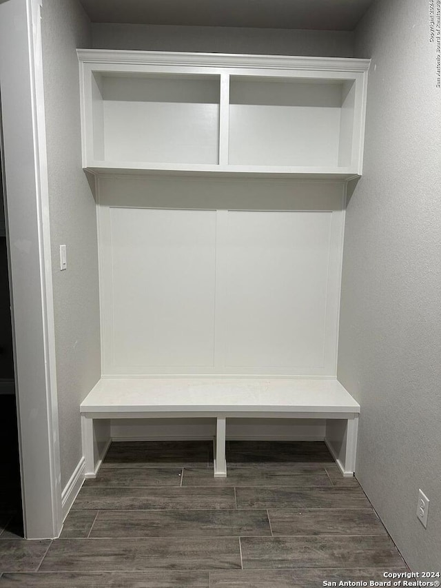 mudroom featuring dark wood-type flooring