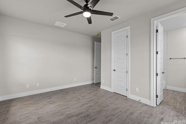 unfurnished bedroom with ceiling fan