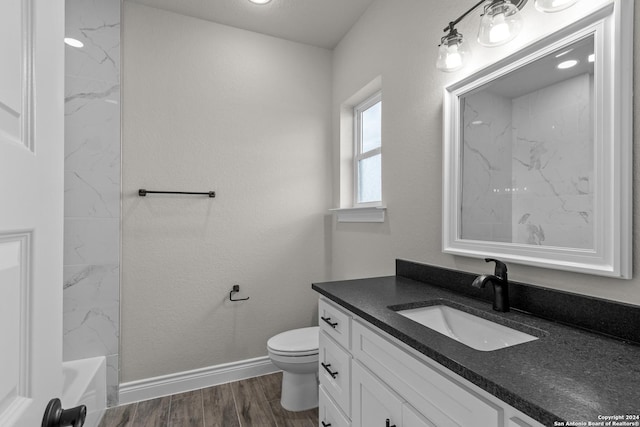 full bathroom with shower / washtub combination, vanity, and toilet