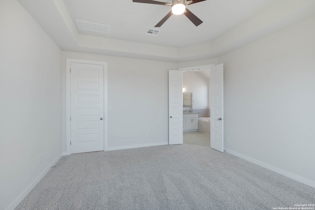 empty room with ceiling fan and light colored carpet