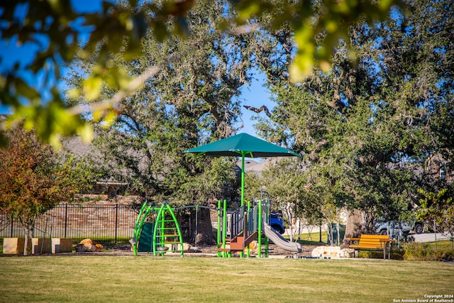 view of playground featuring a yard