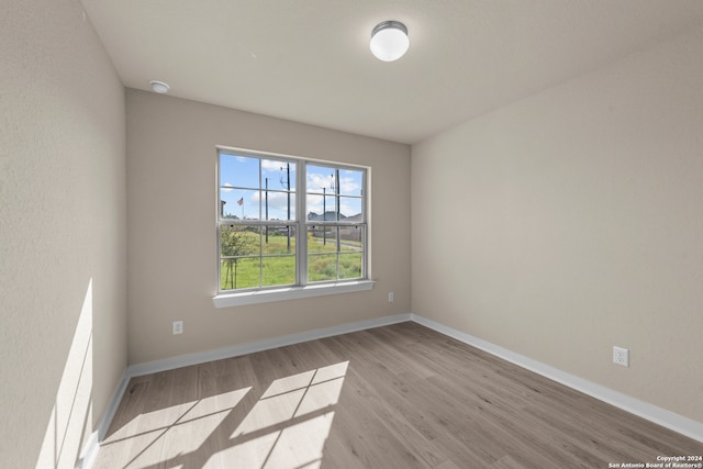 empty room featuring light hardwood / wood-style flooring