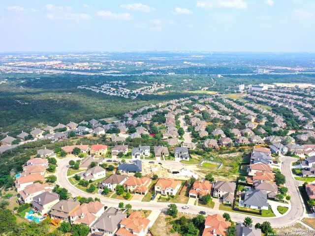 8214 Sierra Hermosa, San Antonio, TX 78255 - aerial view of property and surrounding area featuring nearby suburban area