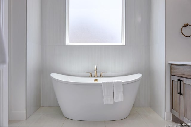 8214 Sierra Hermosa, San Antonio, TX 78255 - bathroom featuring a soaking tub and tile patterned flooring