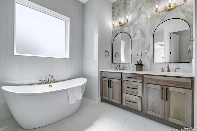 8214 Sierra Hermosa, San Antonio, TX 78255 - full bathroom featuring a soaking tub, double vanity, and tile patterned flooring