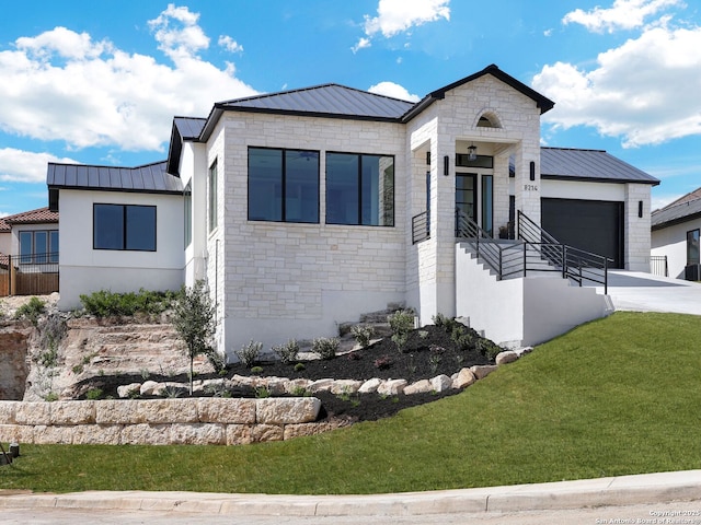 8214 Sierra Hermosa, San Antonio, TX 78255 - contemporary house featuring a standing seam roof, metal roof, an attached garage, a front lawn, and driveway