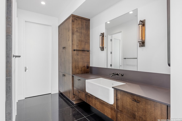 bathroom with vanity and tile patterned floors