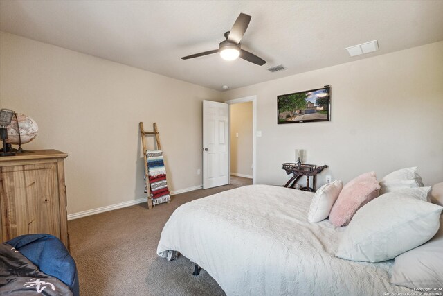 carpeted bedroom featuring ceiling fan