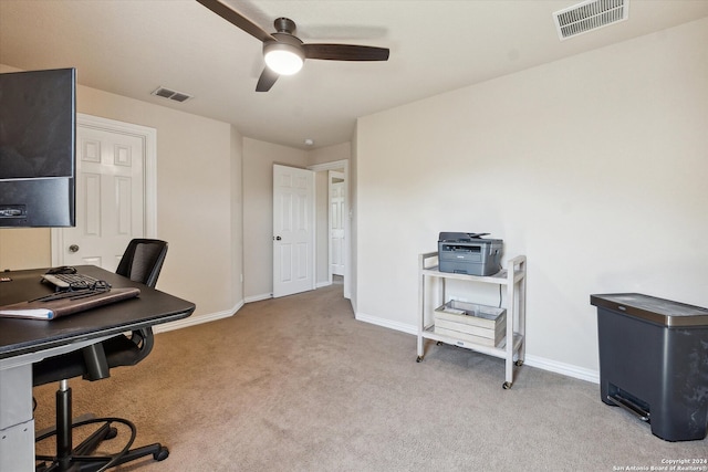 office area with light carpet and ceiling fan