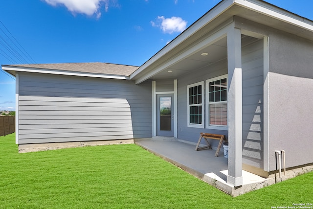 exterior space featuring a lawn