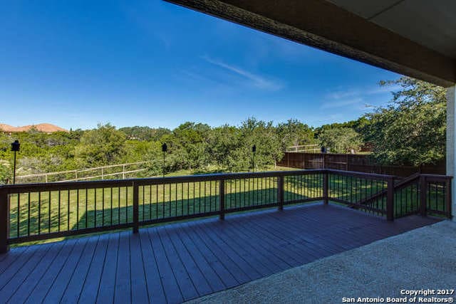 deck featuring a lawn