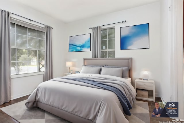 bedroom featuring dark wood-type flooring