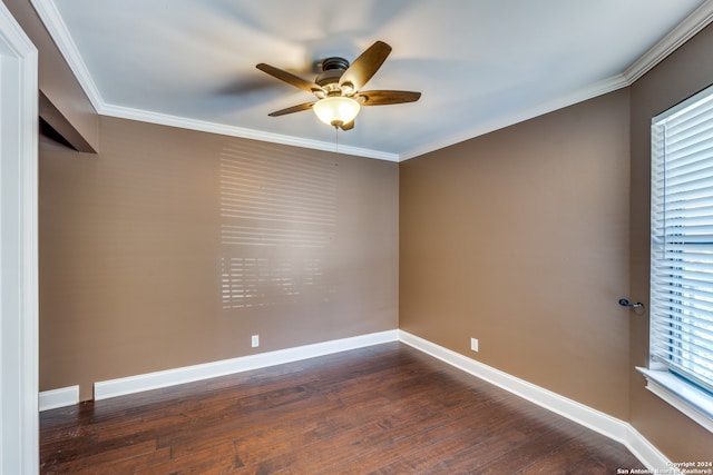 unfurnished room featuring ceiling fan, dark hardwood / wood-style flooring, and crown molding