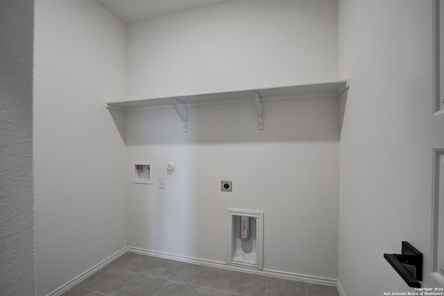 laundry room featuring gas dryer hookup, hookup for a washing machine, and hookup for an electric dryer