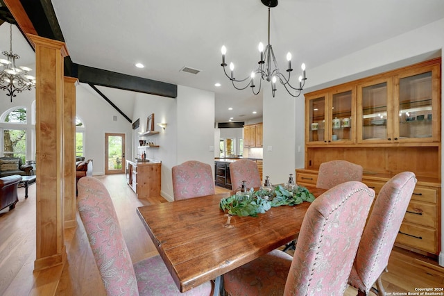 dining space with a wealth of natural light and light wood-type flooring