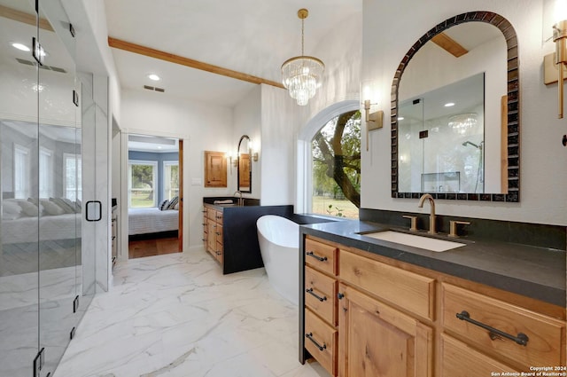 bathroom featuring shower with separate bathtub, tile flooring, an inviting chandelier, and oversized vanity