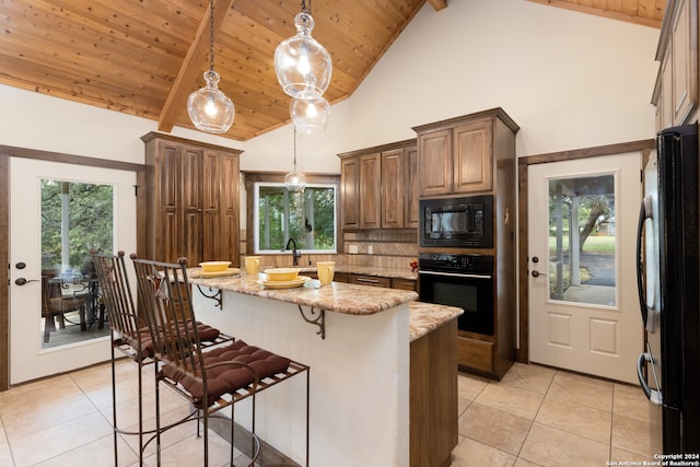 kitchen featuring light tile flooring, tasteful backsplash, black appliances, and wooden ceiling