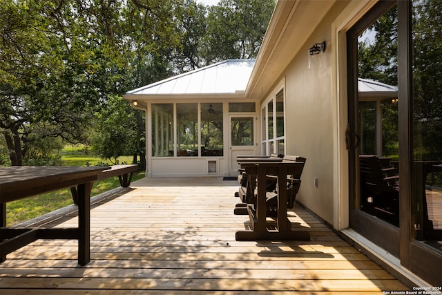 deck featuring a sunroom