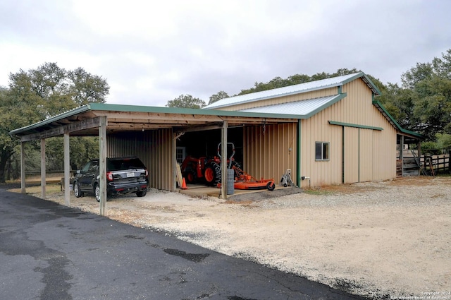 exterior space with a carport