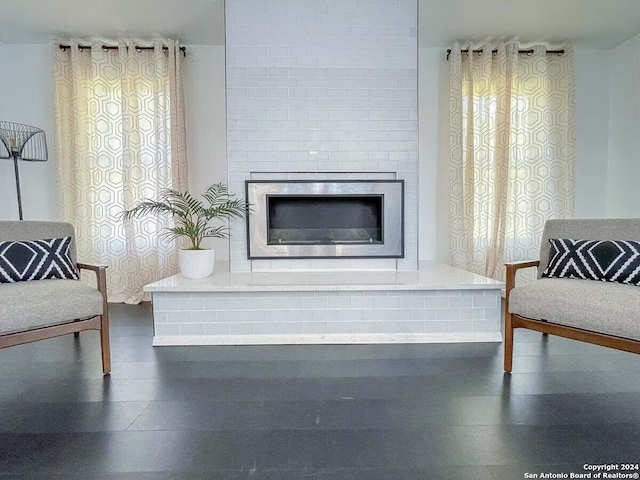 sitting room featuring a fireplace