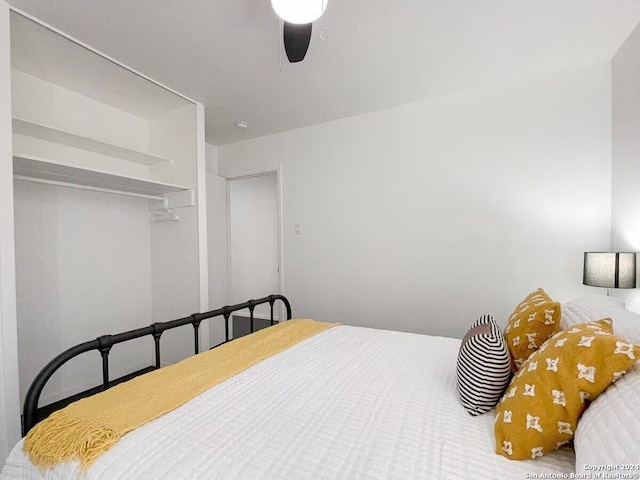 bedroom featuring a closet and ceiling fan