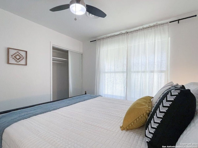 bedroom with a closet and ceiling fan