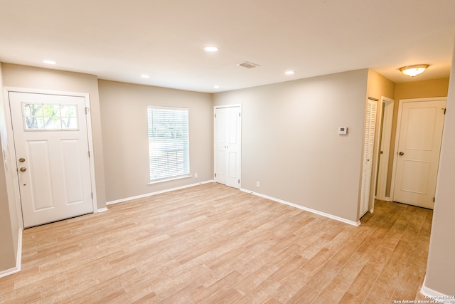 foyer with light wood-type flooring