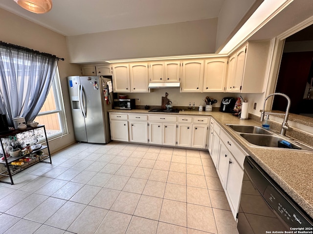 kitchen with sink, white cabinetry, light tile flooring, and black appliances