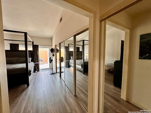 hallway featuring dark wood-type flooring