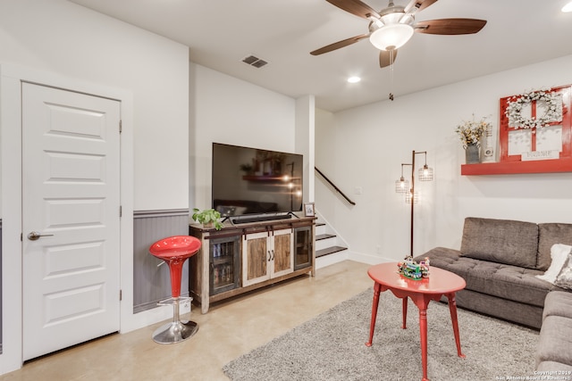 living room featuring ceiling fan