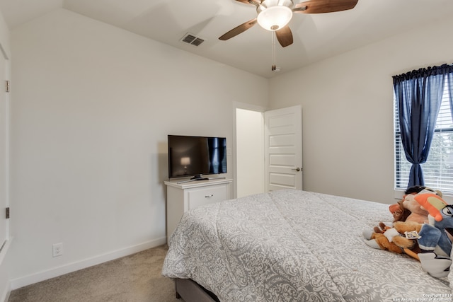 bedroom featuring light colored carpet and ceiling fan