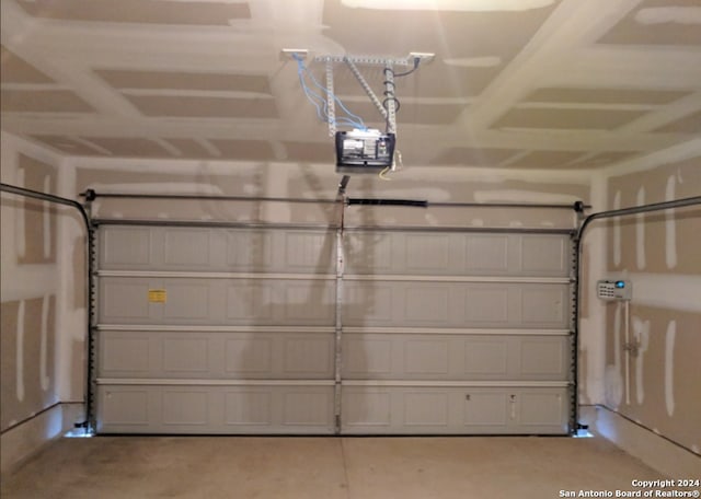 garage featuring a garage door opener