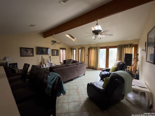 living room featuring ceiling fan, vaulted ceiling with beams, and light tile floors