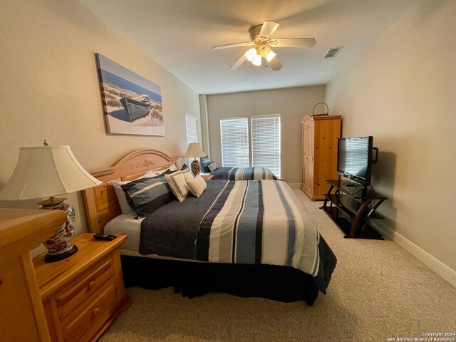 54 Pelican Prt, Oconnor, TX 77982 - bedroom featuring light colored carpet and ceiling fan
