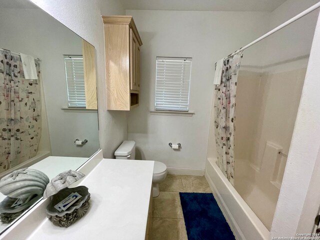 54 Pelican Prt, Oconnor, TX 77982 - full bathroom with vanity with extensive cabinet space, shower / bathtub combination with curtain, toilet, and tile flooring